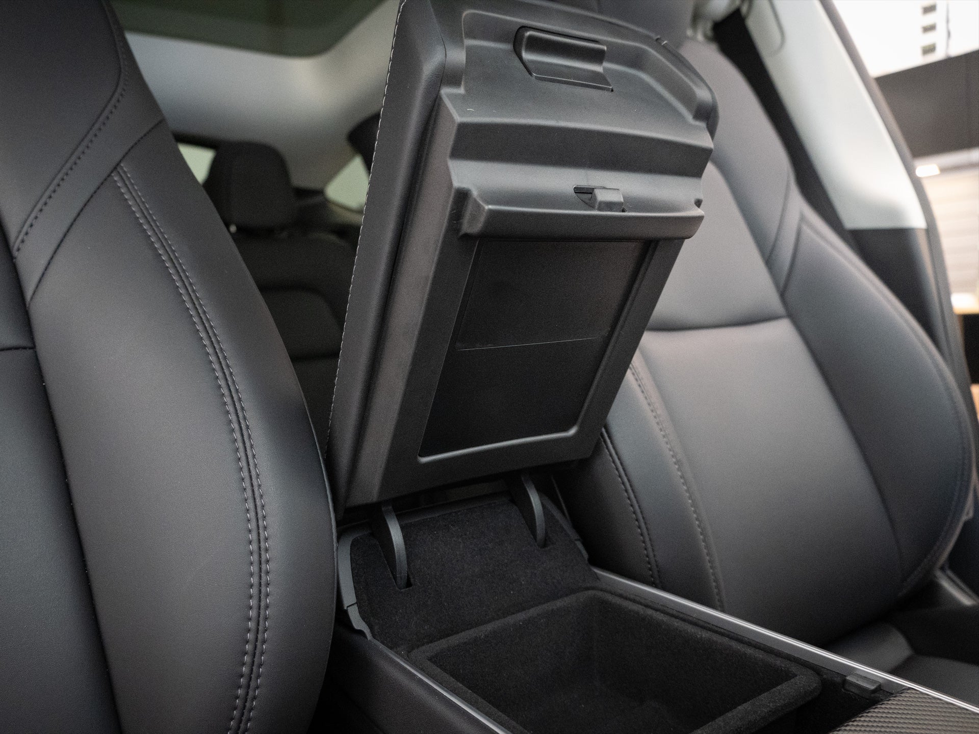 Tesla Model Y Armrest Hidden Storage Compartment