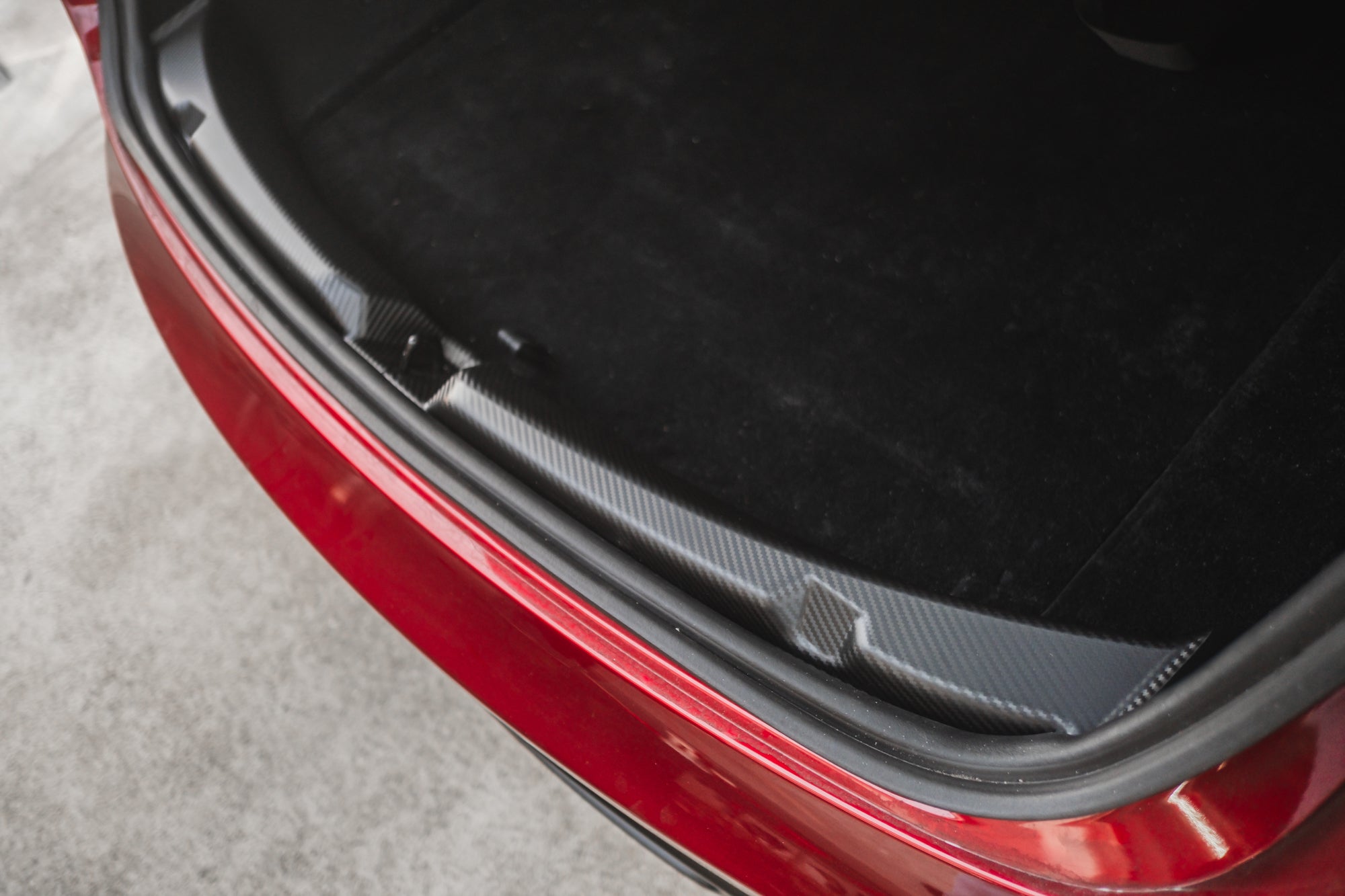 Tesla Model 3 Highland Trunk Sill Protector Carbon Fiber Pattern