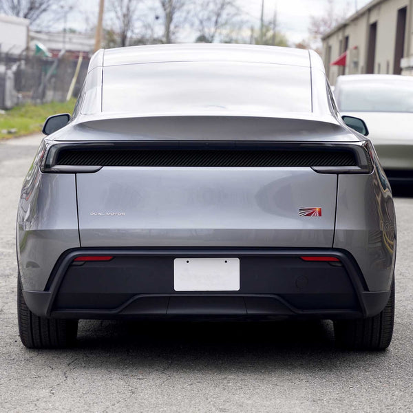 https://shop.teslarati.com/cdn/shop/files/tesla-model-y-juniper-reflective-panel-wrap-black-carbon-fiber.jpg?v=1747933287&width=600